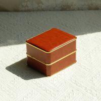 Rounded PU gold edged...