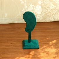 Ear shaped earring hold...