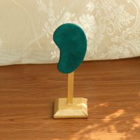 Ear shaped earring hold...